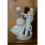 A LLADRO FIGURE GROUP, 'Masquerade Ball' No 5452 designed by Francisco Catala height 22.5cm