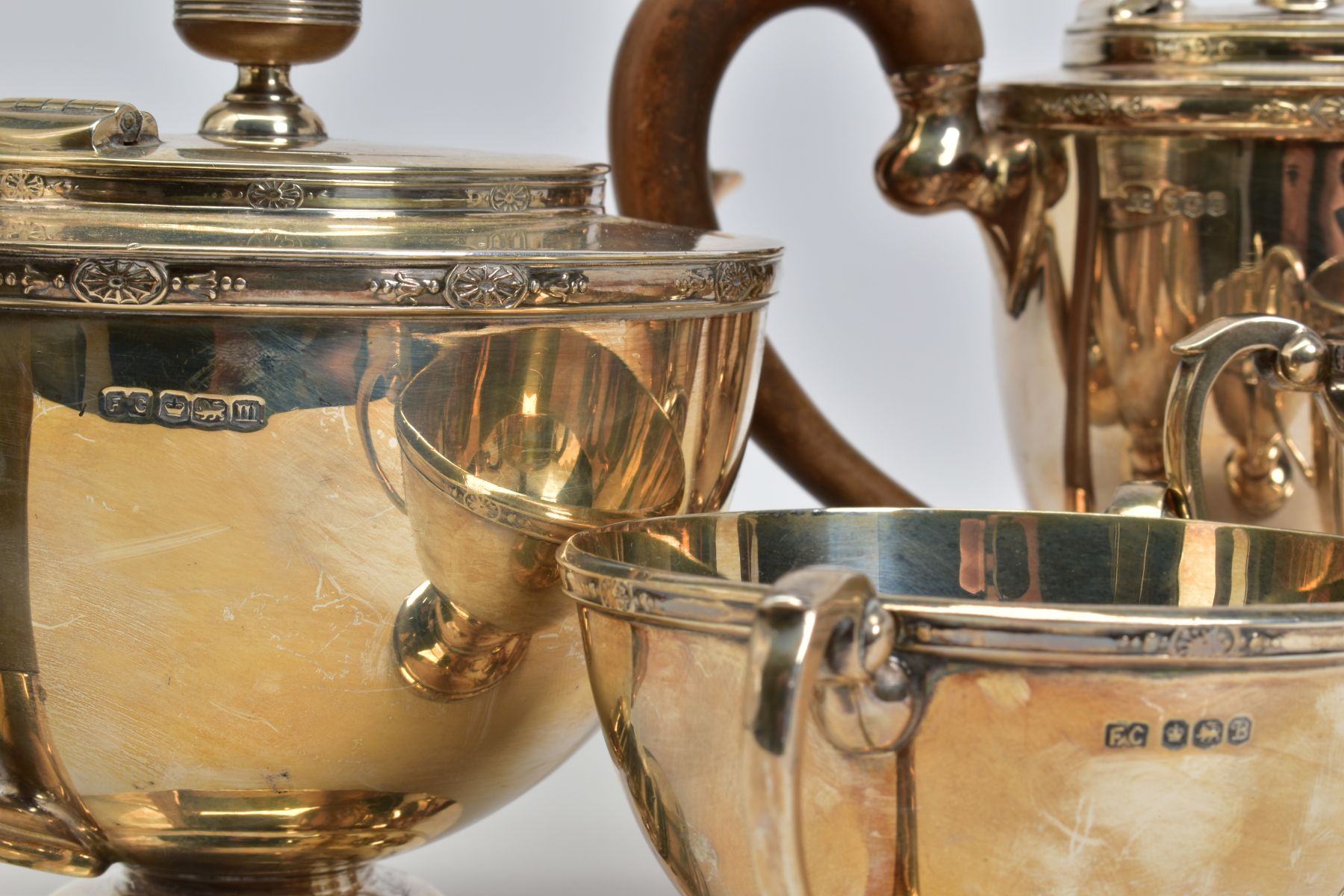 A MATCHED GEORGE V AND ELIZABETH II SILVER FOUR PIECE TEA SERVICE OF CIRCULAR FORM, cast rims with - Image 6 of 6
