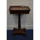 A LATE VICTORIAN MAHOGANY WORK TABLE, with a wavy and foliate gallery, central lid enclosing a tin