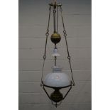 AN EARLY 20TH CENTURY BRASS RISE AND FALL CEILING OIL LAMP, with glass shades and funnel, diameter