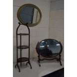 AN EDWARDIAN MAHOGANY THREE TIER FOLDING CAKE STAND, together with a mahogany oval toilet mirror (sd