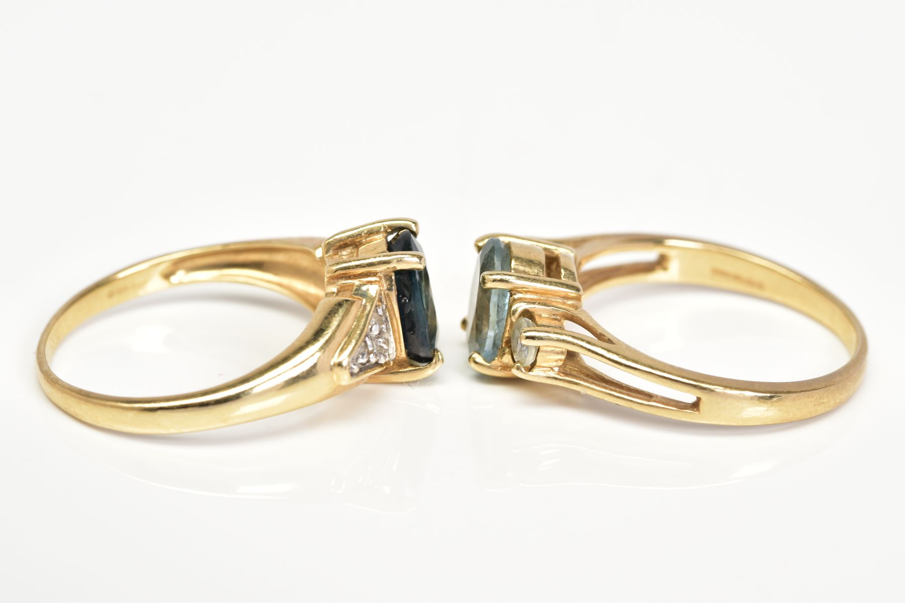 TWO 9CT GOLD GEM SET RINGS, the first designed with a claw set oval cut sapphire, to the single - Image 2 of 3