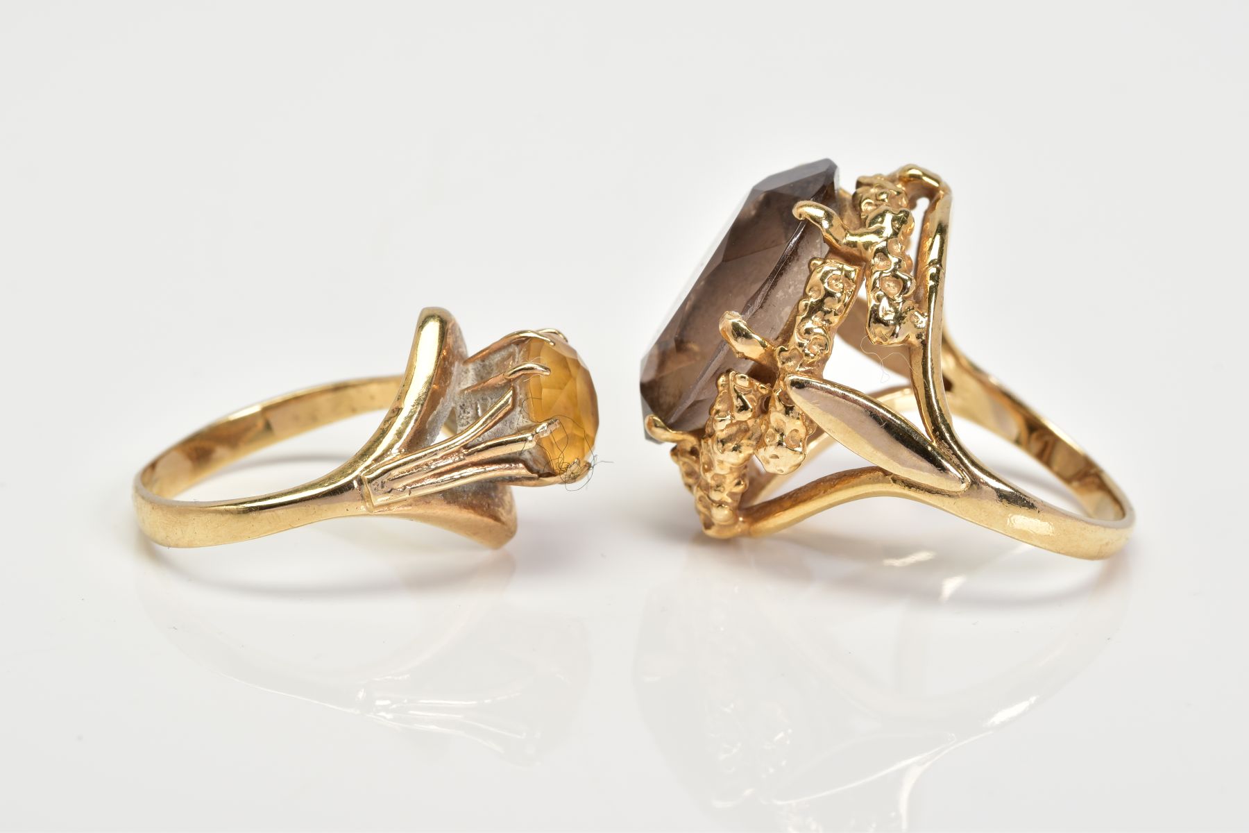 TWO 9CT GOLD GEM SET RINGS, the first ring designed with a claw set oval cut smokey quartz, within a - Image 2 of 3