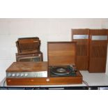 A VINTAGE FERGUSON MODEL 3400 RADIO GRAM, standing on a teak stand, fitted with a Garrard SP12 Mk2