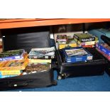 FIVE SUITCASES CONTAINING BOXED JIGSAW, PUZZLES including Waddington's, Gibsons, Arrow Games,