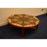 A CIRCULAR TRIOH OX ART DANISH TEAK COFFEE TABLE on a cross framed visible mortice and tenon joint