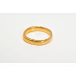 A 22CT GOLD BAND, the plain polished band, with a 22ct hallmark for Birmingham, ring size J,