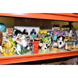 A GOOD COLLECTION OF NOVELTY TEAPOTS, including Trotters Independent Trading Co van, Bertie Bassett,