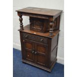 A SMALL EARLY 20TH CENTURY CARVED OAK COURT CUPBOARD, with a single drawer, width 69cm x depth
