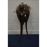 AN EDWARDIAN MAHOGANY JARDINERE STAND with boxwood banding on three tapered and splayed legs and a