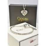 TWO SILVER CLOGAU JEWELLERY ITEMS, a silver half engraved bangle with silver chain slider rose