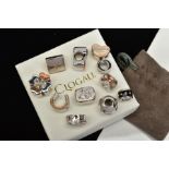 ELEVEN ASSORTED CLOGAU SILVER BEAD CHARMS, various designs to include a butterfly, a horseshoe,
