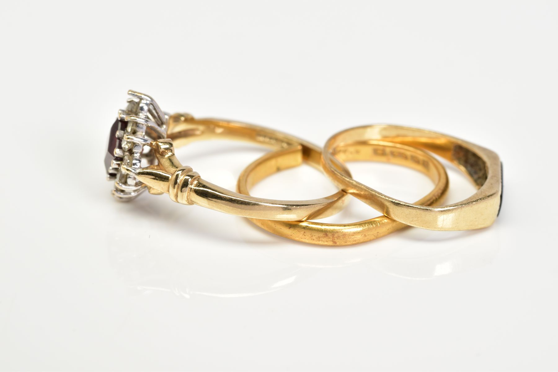 A 22CT GOLD BAND TWO 9CT GOLD RINGS, the plain polished band with a 22ct hallmark for Birmingham, - Image 2 of 3