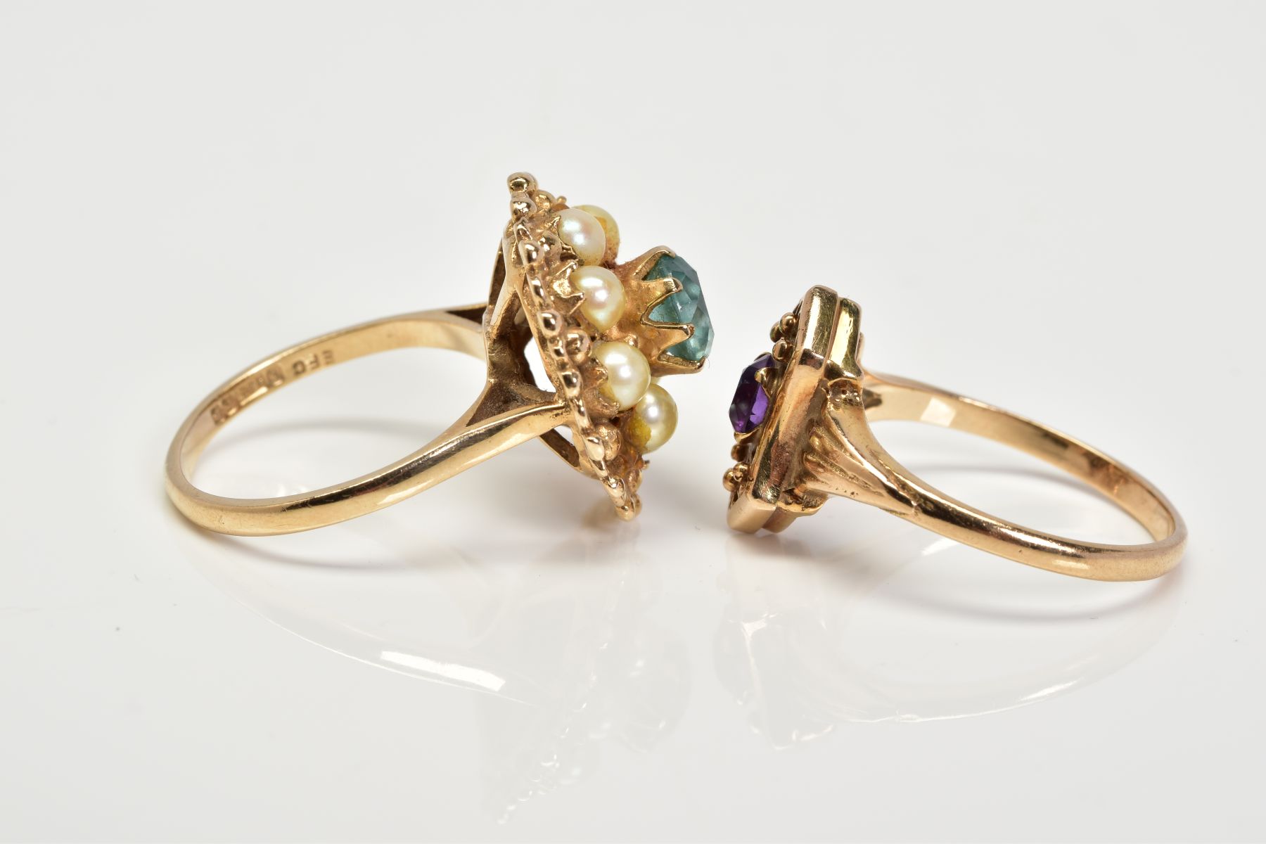 TWO 9CT GOLD GEM SET RINGS, the first of cluster design set with a central circular blue stone - Image 2 of 3