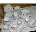 A QUEEN'S BONE CHINA DINNER SERVICE 'CLAIRE' PATTERN, four cereal bowls, four dessert plates, four