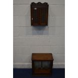 AN EARLY 20TH CENTURY OAK HANGING TWO DOOR SMOKERS CABINET, with two internal drawers, width 33cm