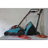 A BOSCH ROTAK 34 1400 W LAWN MOWER with grass box and a Black and Decker strimmer (both PAT pass and