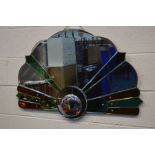 AN ART DECO SUN BURST WALL MIRROR, with multiple colour shades, width 94cm x 62cm