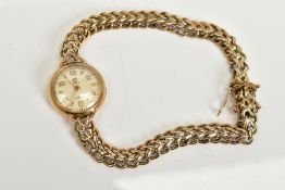 A 9CT GOLD LADIES WRISTWATCH, cream dial, Arabic and baton numerals, dial signed 'Cyma', case with a