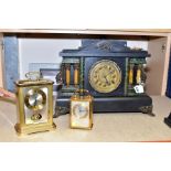 A VICTORIAN EBONISED MANTEL CLOCK with marble effect pillar either side of the gilt dial with Arabic