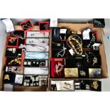 TWO BOXES OF COSTUME JEWELLERY AND ITEMS, to include an embellished lion and cat in a shoe trinket