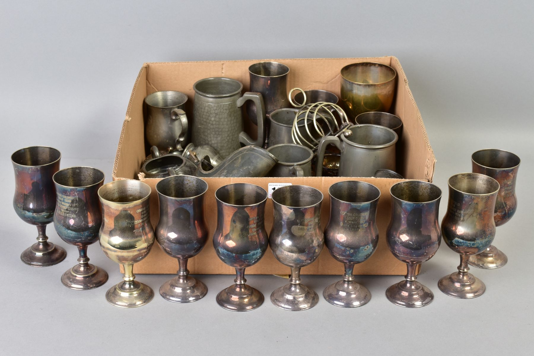 A BOX OF SILVER PLATE AND PEWTER, including tankards, goblets, etc