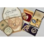 A SELECTION OF ITEMS, to include a gold plated floral engraved hinged bangle, a white metal openwork