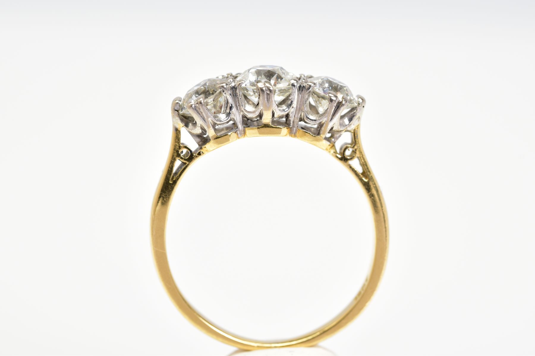 A NEARLY TO MID 20TH CENTURY THREE STONE DIAMOND RING, three transitional cut diamonds, measuring - Image 5 of 5