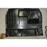 A FORD TRANSIT SHEET STEEL BULKHEAD, width 175cm x height 138cm (some corners and panel dents) and a