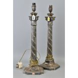 A PAIR OF EARLY 20TH CENTURY SILVER PLATED TABLE LAMPS, of Corinthian column form, the fluted