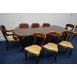 A VICTORIAN MAHOGANY WIND OUT DINING TABLE, moulded top with rounded corners, two additional leaves,