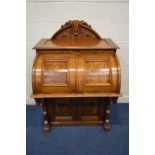 AN EARLY 20TH CENTURY KEARNEY AND WIGGERS WALNUT AND BURR WALNUT MECHANICAL DESK, with a removable
