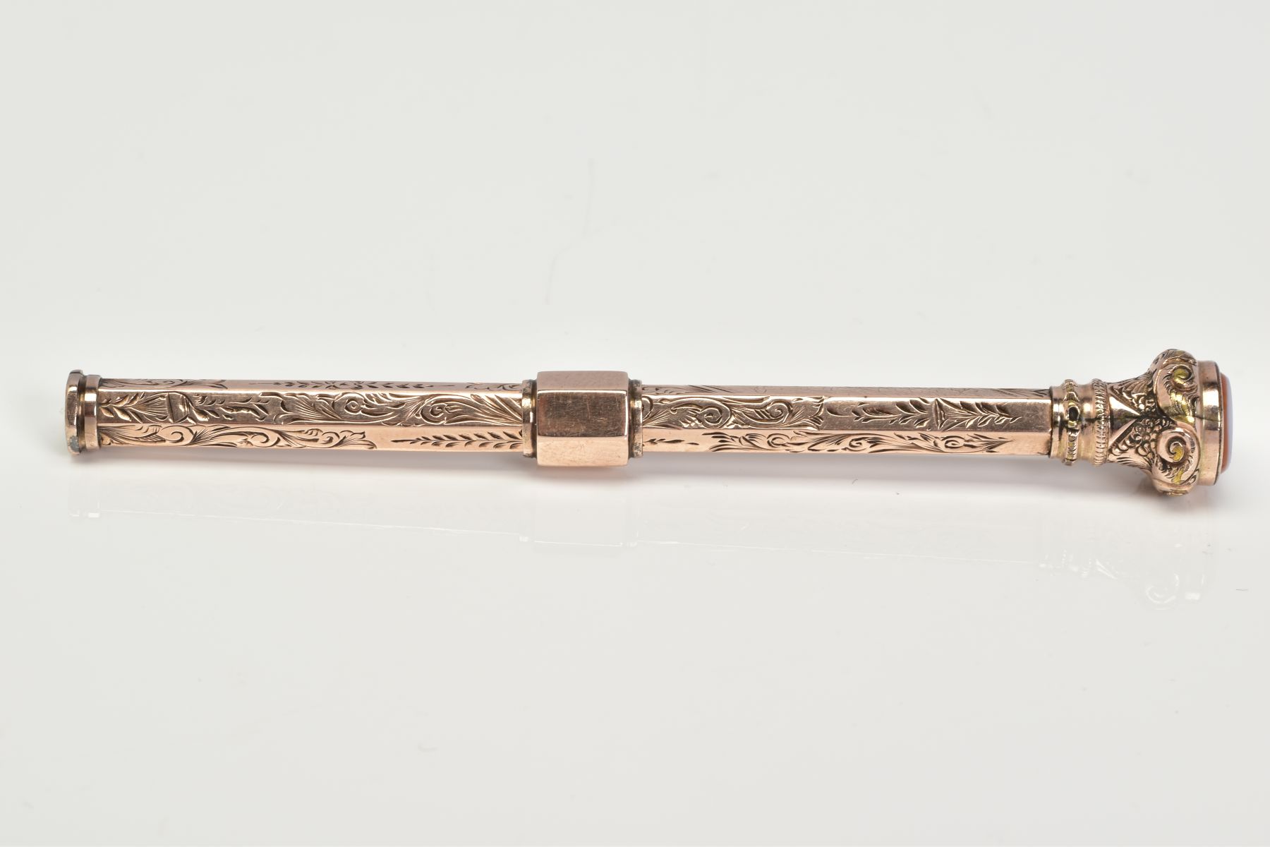 A YELLOW METAL RETRACTABLE PENCIL, designed with a floral engraved pattern to the body of the - Image 5 of 5