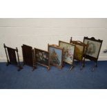 SEVEN VARIOUS FIRE SCREENS of various ages, styles and sizes