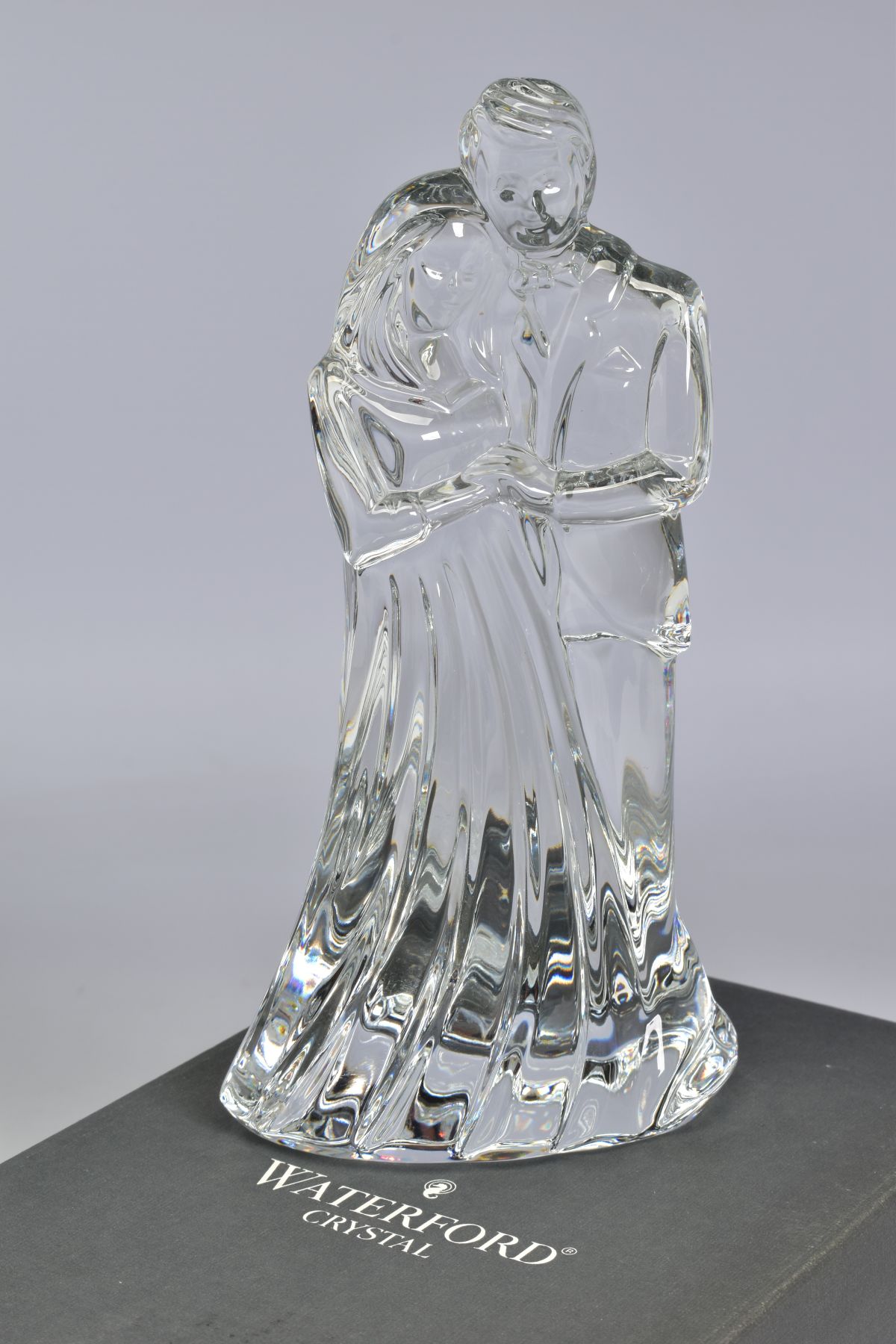 A BOXED WATERFORD CRYSTAL FIGURE GROUP, 'Bride and Groom', stamped to base, height 18.5cm