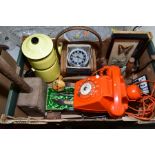 A 1970'S FRENCH SOCOTEL 63 TELEPHONE in orange, with additional ear piece, body loose on chassis,