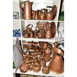 A COLLECTION OF COPPER WARE, including moulds, fish moulds, fruit moulds, colander, kettles, hot