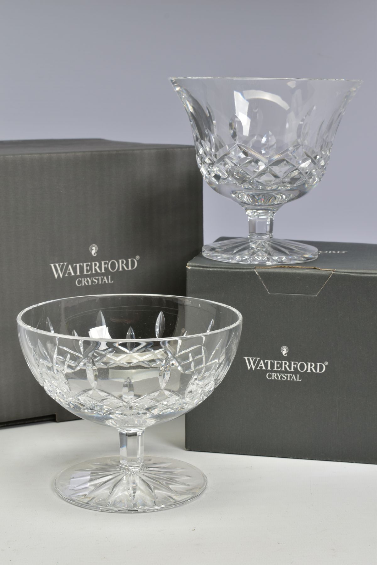 TWO BOXED WATERFORD CRYSTAL LISMORE FOOTED BON BON DISHES, both stamped to base, heights 12cm x 11cm