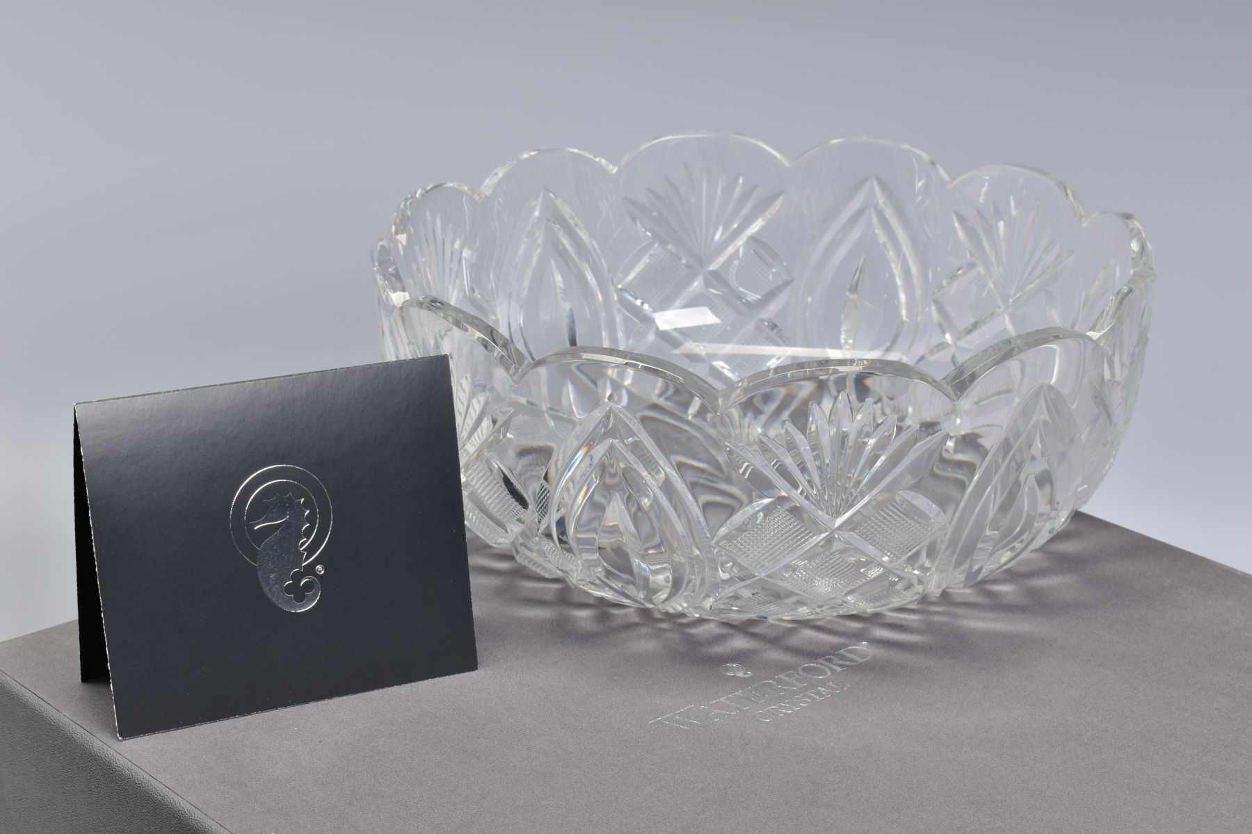 A BOXED WATERFORD CRYSTAL ARTISAN CRAFTSMAN BOWL, with scalloped edge, stamped to base, height