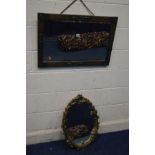 AN EARLY 20TH CENTURY BRASS ARTS AND CRAFTS STYLE FRAMED BEVELLED EDGE WALL MIRROR, 76cm x 51cm
