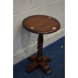 AN OLD CHARM OAK CIRCULAR TOPPED LAMP TABLE, diameter 38cm x height 57cm
