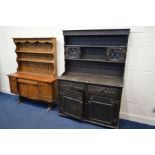 A DARK OAK DRESSER together with a rustic golden oak sideboard and a pine hanging plate rack (