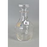 A GLASS DECANTER AND SILVER LABEL, glass decanter with stopper, height approximately 22cm,
