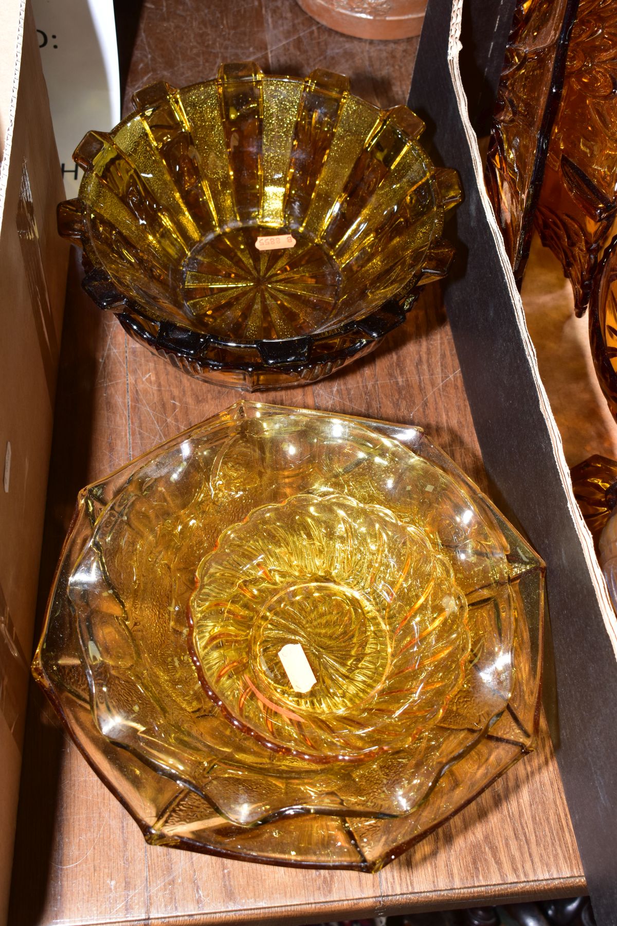 THREE BOXES OF PRESS MOULDED AMBER GLASS to include bowls, storage containers, candlesticks, water - Bild 2 aus 6