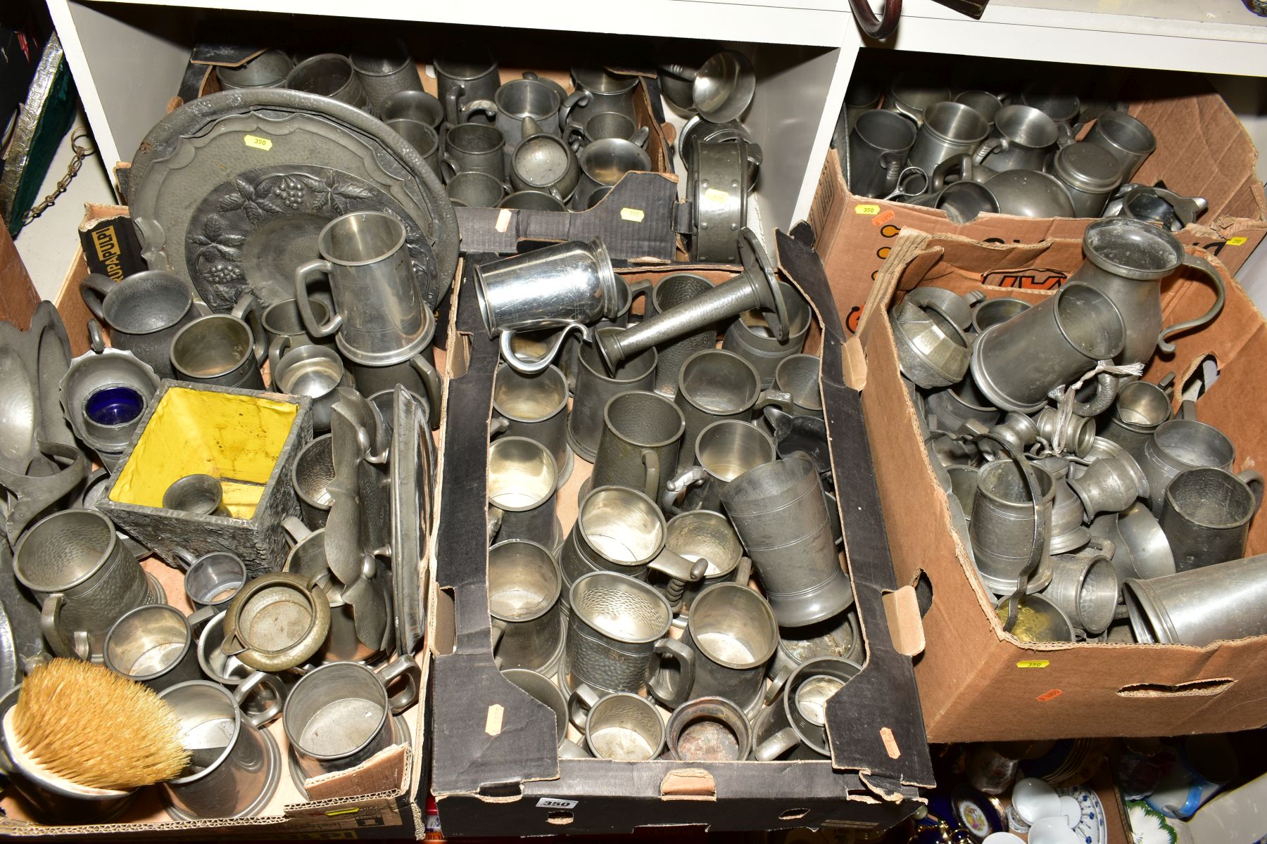 FIVE BOXES AND LOOSE OF PEWTER AND LOOSE, including tankards, plates, embossed plates, hammered