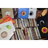 A TRAY CONTAINING OVER THREE HUNDRED 7'' SINGLES, including music from the 1960's to 1980's by