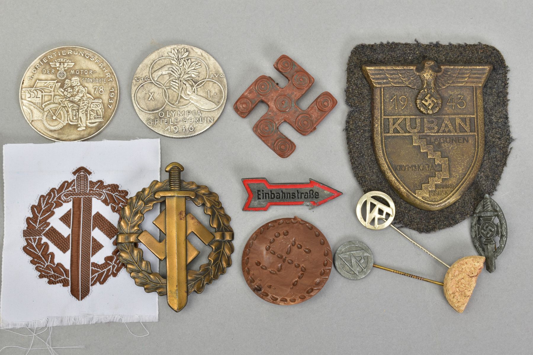 A SMALL COLLECTION OF GERMAN 3RD REICH BADGES ETC, together with two medallions, as follows, (a)