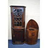 A GEORGIAN MAHOGANY ASTRAGAL GLAZED SINGLE DOOR CORNER CUPBOARD, ona later pine base, width 78cm x