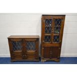 A MID 20TH CENTURY OAK LEAD GLAZED TWO DOOR BOOKCASE, width 73cm x depth 34cm x height 173cm and a
