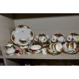 A QUANTITY OF ROYAL ALBERT OLD COUNTRY ROSES TEA WARES, ETC, some seconds, comprising two bread